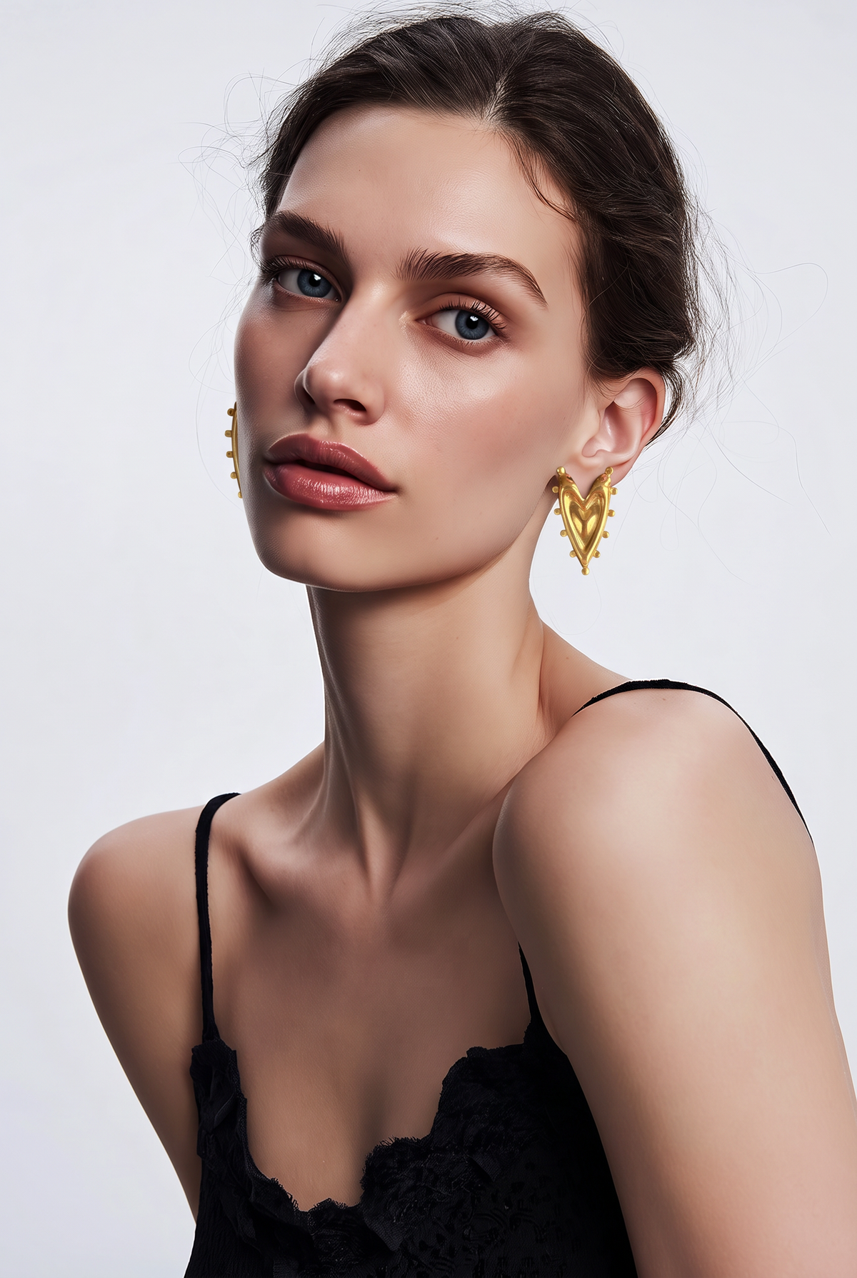 Golden Sculpted Heart Statement Earrings