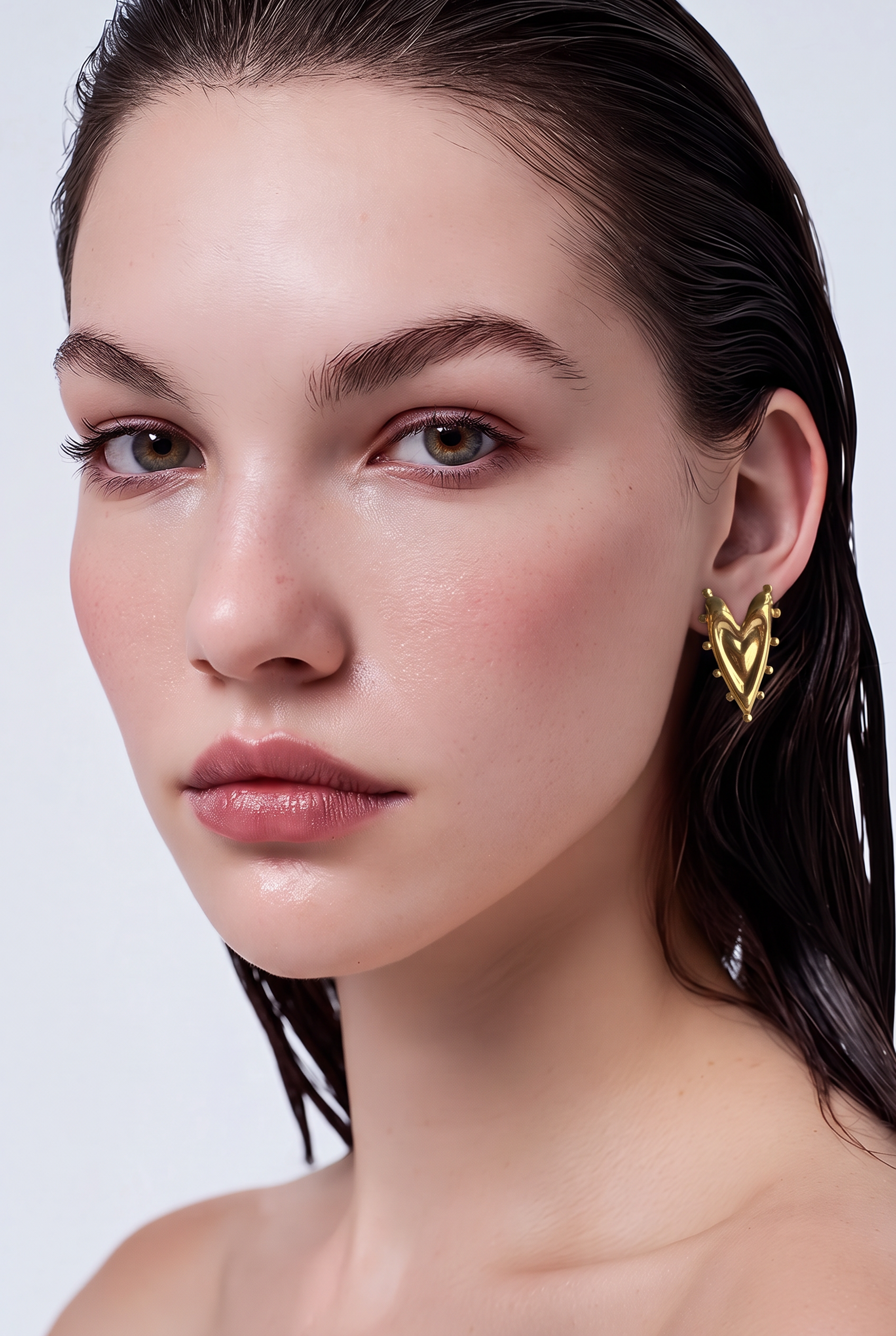 Golden Sculpted Heart Statement Earrings