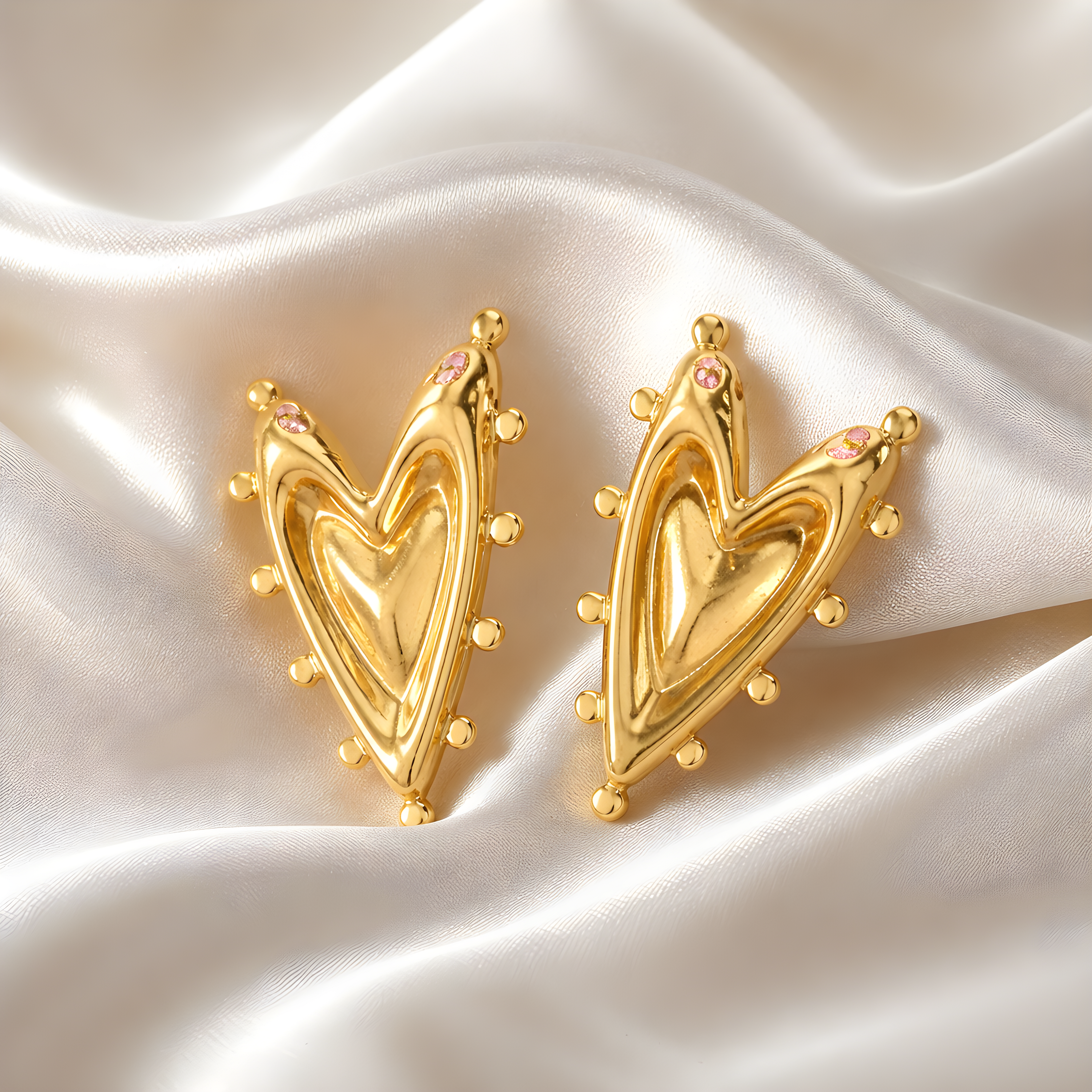 Golden Sculpted Heart Statement Earrings